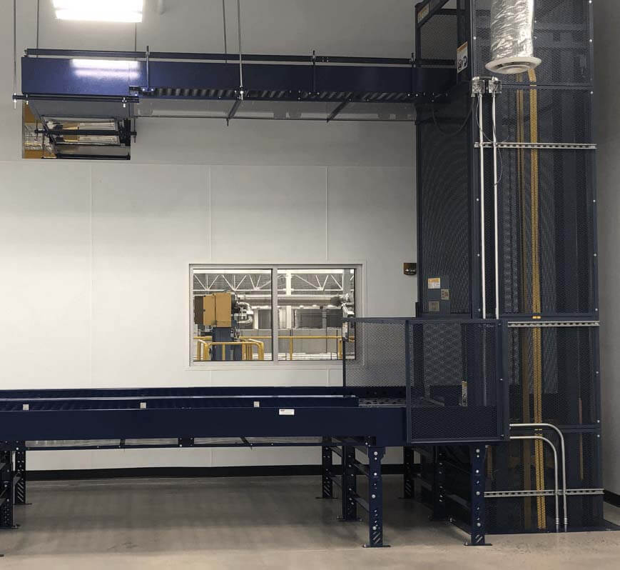 Vertical Reciprocating Conveyor as part of a conveyor system